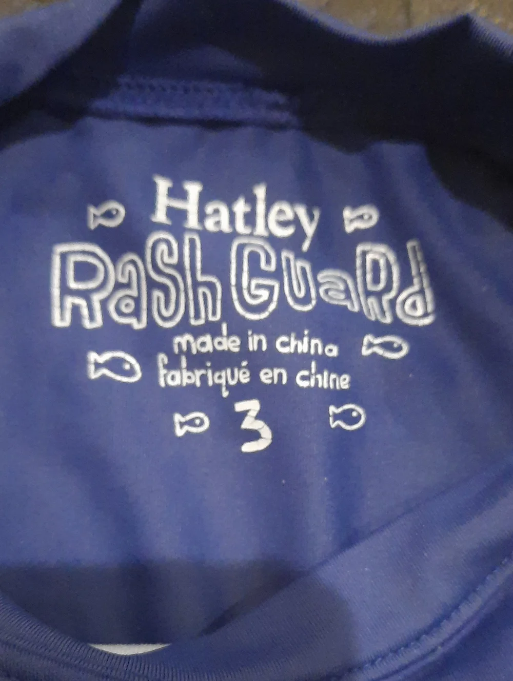 Hatley Blue Rashguard with Pink & White Starfish Sleeves
